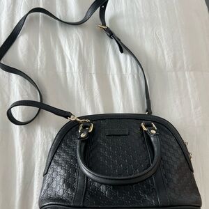 Black Gucci handbag